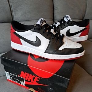 Nike Air Jordan 1s low black toe